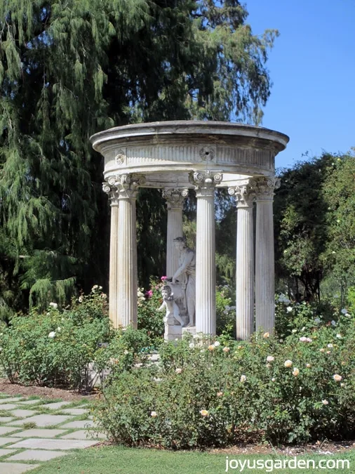 A seating area with columns in the Rose Garden 