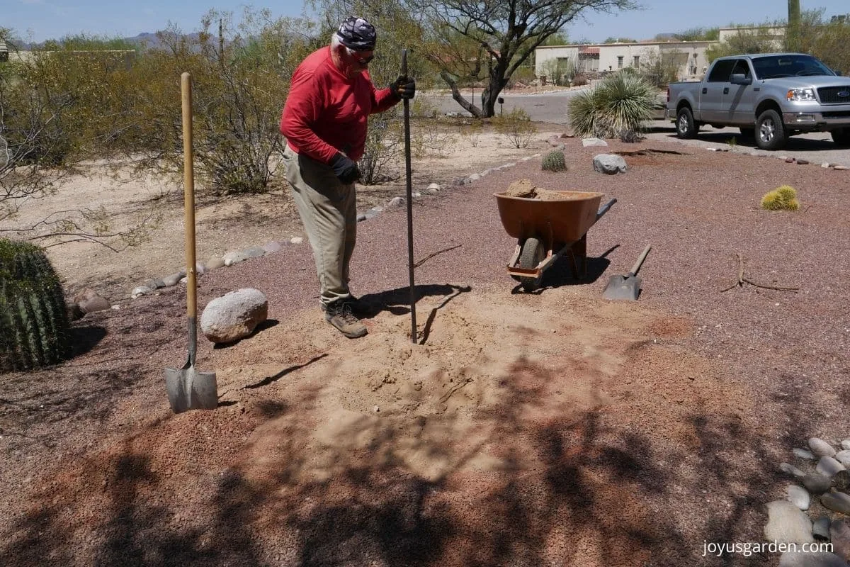 man digging hole