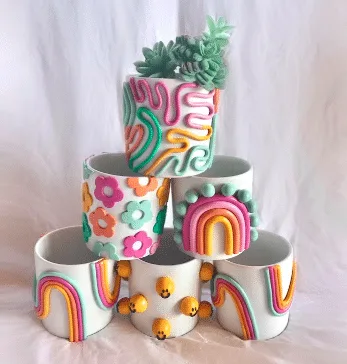 Multicolor rainbow retro planters for succulents from Etsy.