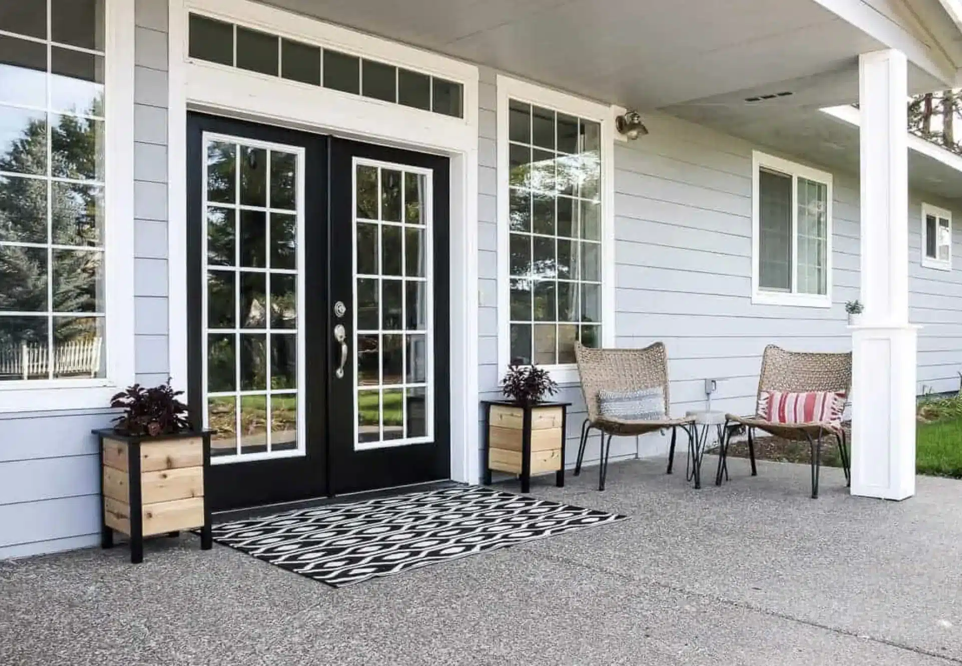 two DIY planter boxes on front porch